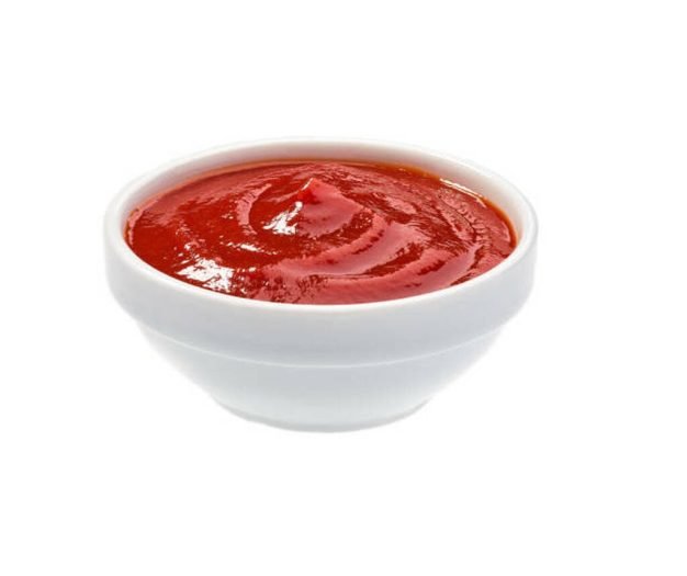 Ketchup in bowl isolated on white background. Portion of tomato sauce