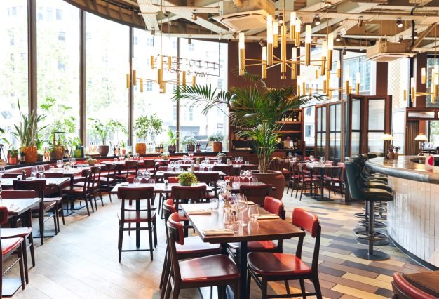 Contemporary restaurant interior with table settings